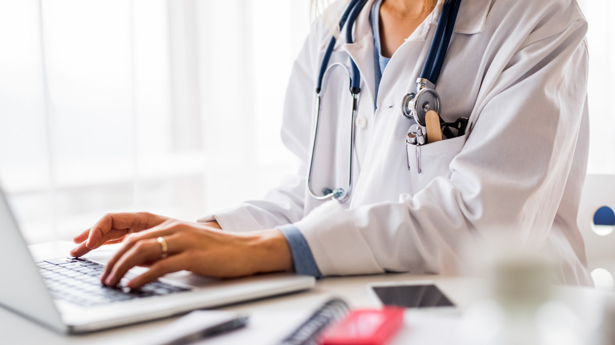 Doctor using a laptop