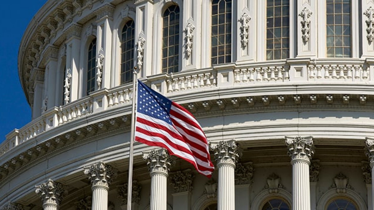 Capitol with flag waving