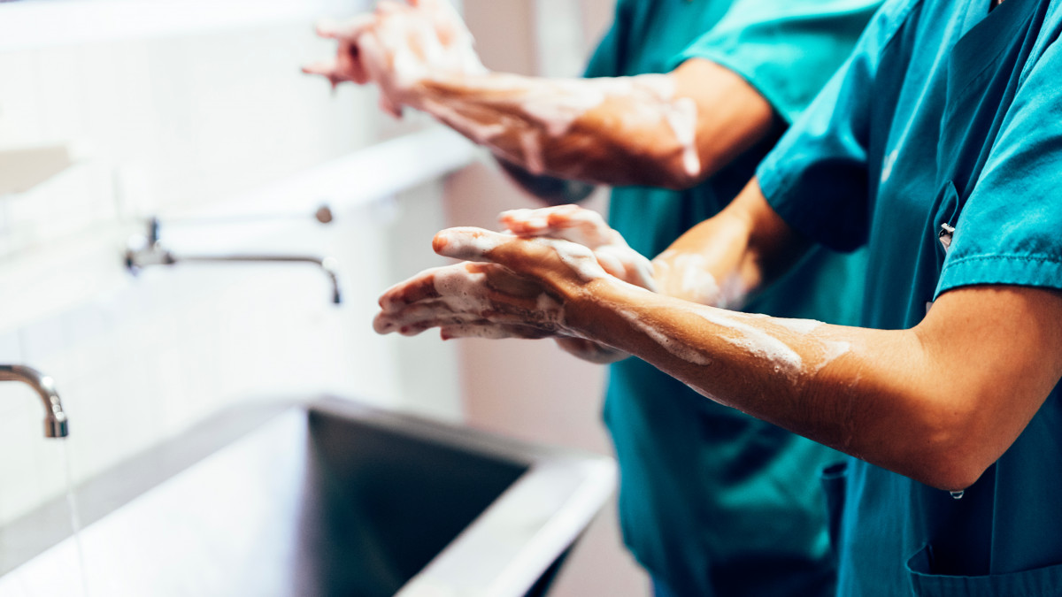 Two doctors washing their hands