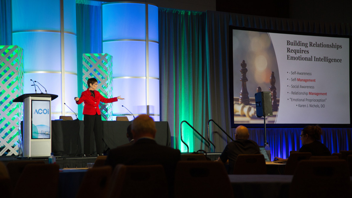 Karen Nichols, DO, MACOI, speaking at ACOI 2025