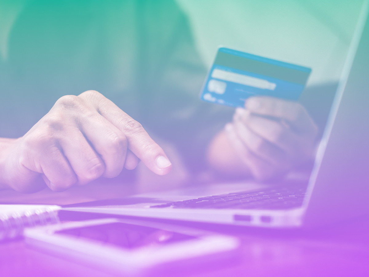 Person shopping online with a credit card