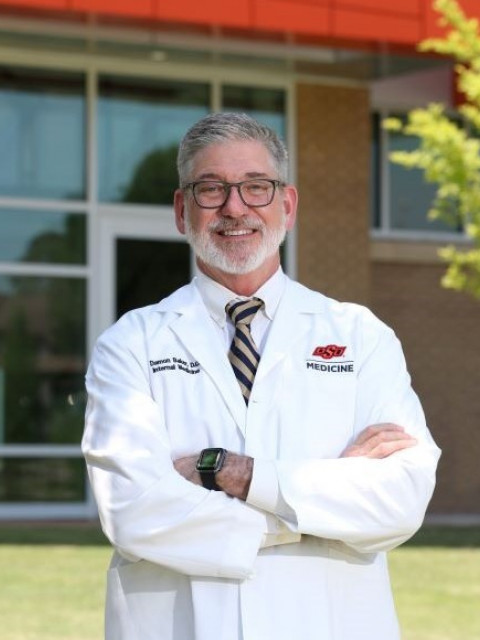 Damon Baker, DO, MACOI